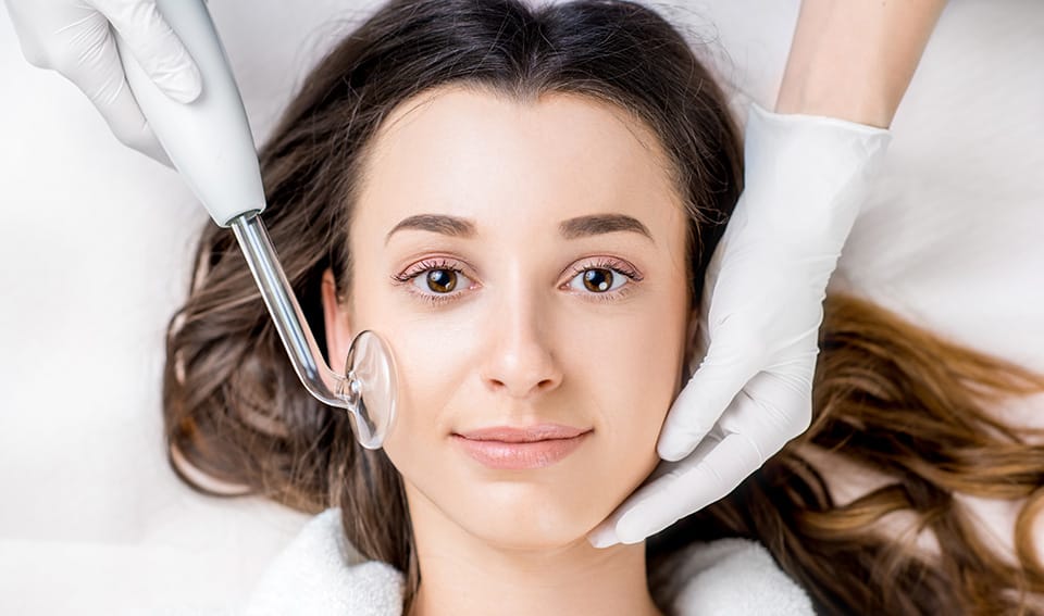 acne facial with high frequency service img